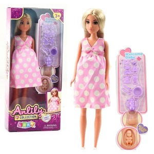 Lalka Anlily w ciąży sukienka w kropki akcesoria