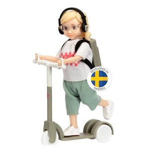 Lalka dziewczynka na hulajnodze