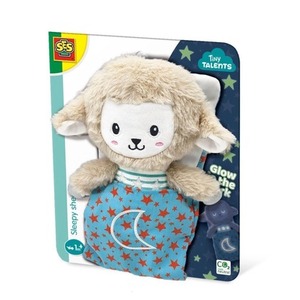 Owieczka śpiąca świeci w ciemności